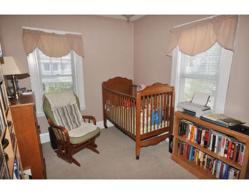 39 Inverness Road Arlington, MA 02476 - Photo 9 of 19 a bedroom with furniture and a window