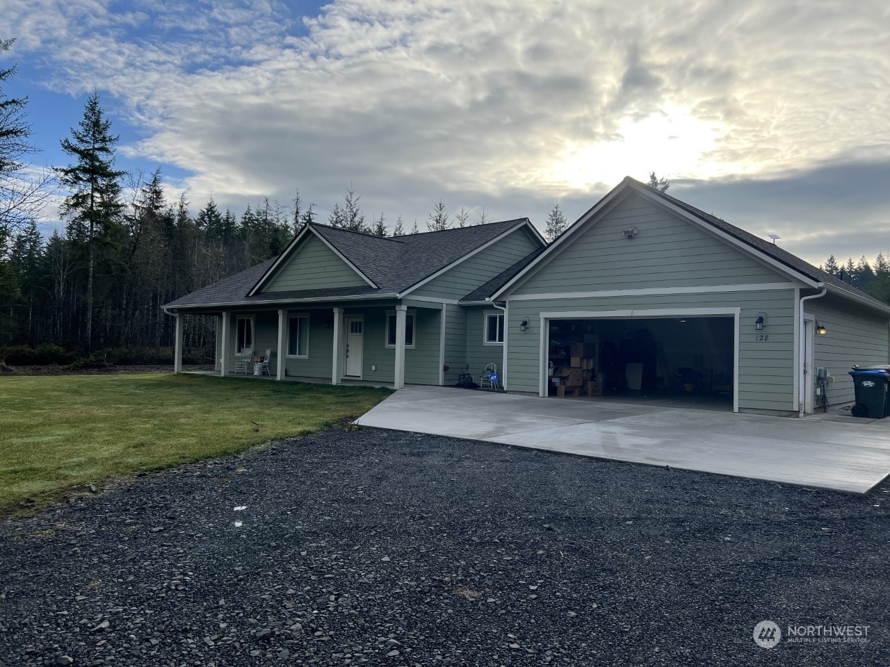 128 Pollman Road Chehalis, WA 98532 - Photo 1 of 1 a front view of a house with a garden and yard