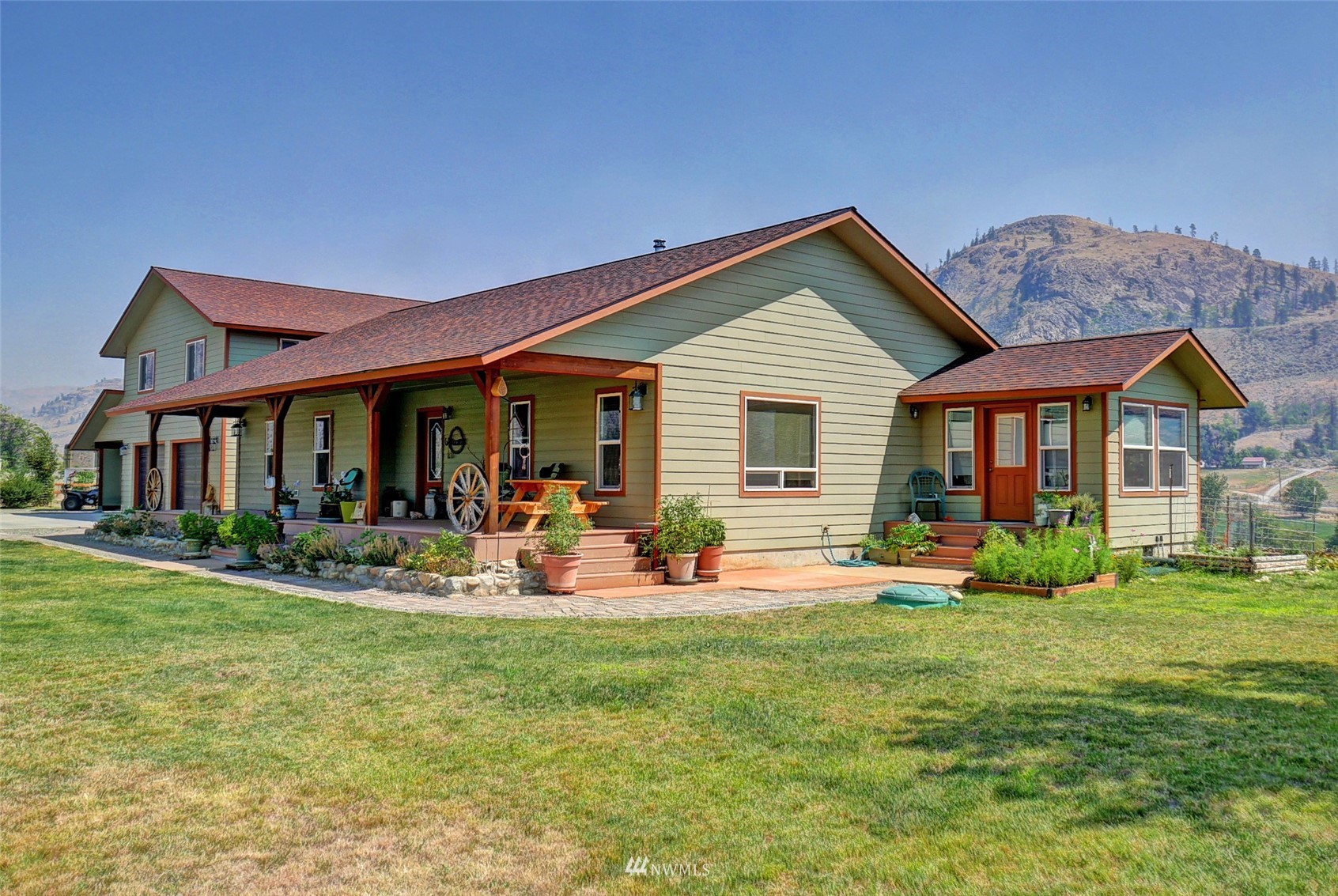 196 Pharr Road Riverside, WA 98849 - Photo 1 of 40 a front view of house with yard and porch
