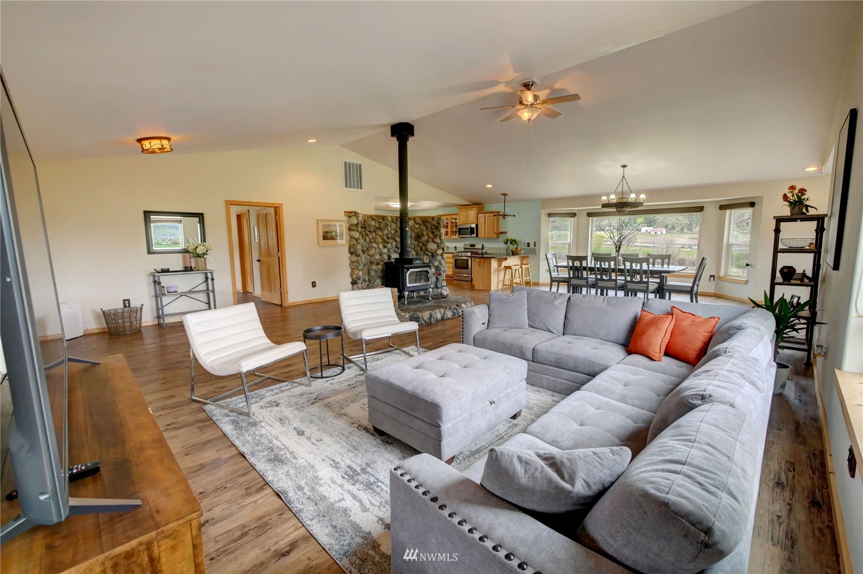 196 Pharr Road Riverside, WA 98849 - Photo 11 of 40 a living room with furniture and a chandelier
