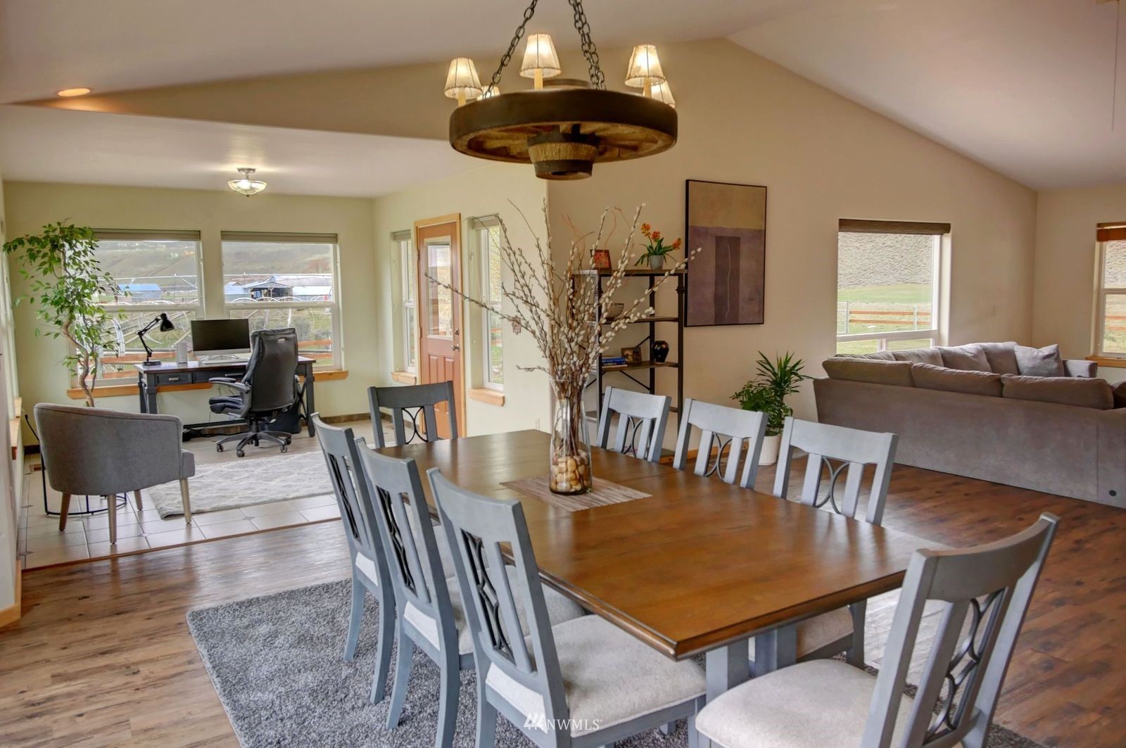 196 Pharr Road Riverside, WA 98849 - Photo 17 of 40 a view of a dining room with furniture and wooden floor