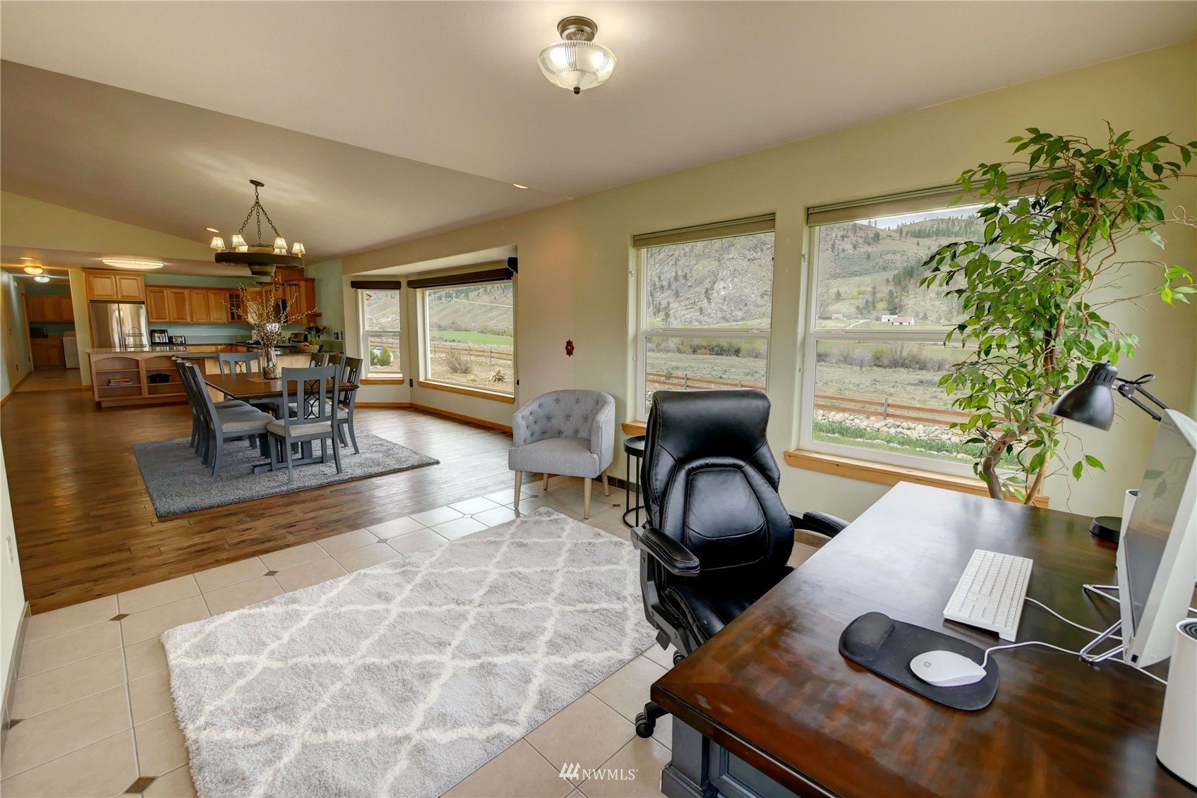 196 Pharr Road Riverside, WA 98849 - Photo 19 of 40 a living room with furniture and a chandelier