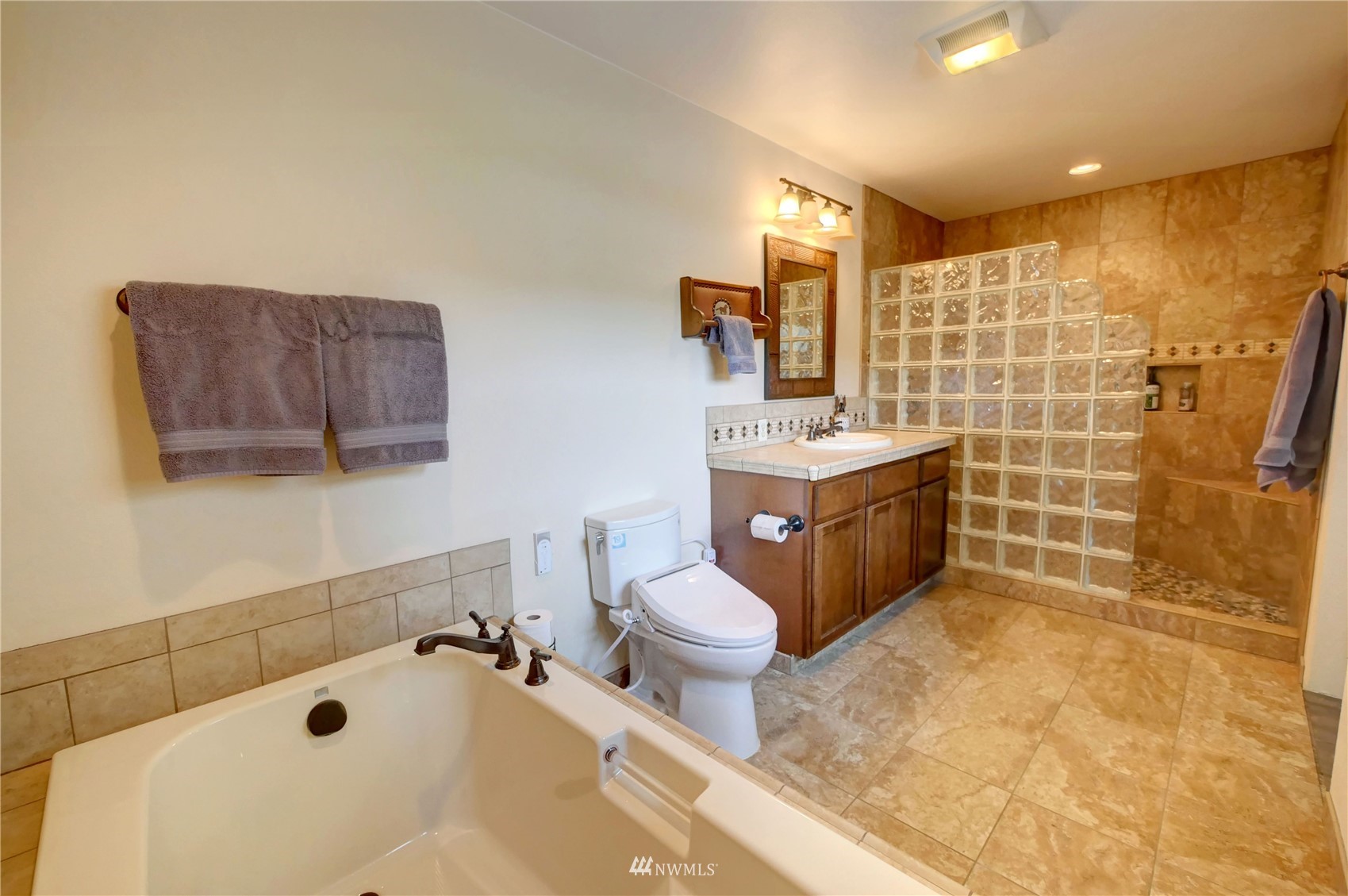 196 Pharr Road Riverside, WA 98849 - Photo 21 of 40 a bathroom with a sink toilet and shower