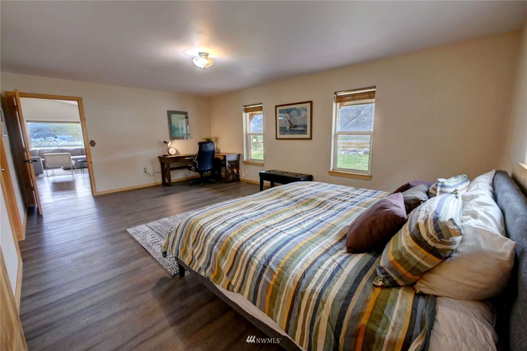 196 Pharr Road Riverside, WA 98849 - Photo 23 of 40 a bedroom with a bed and a couch