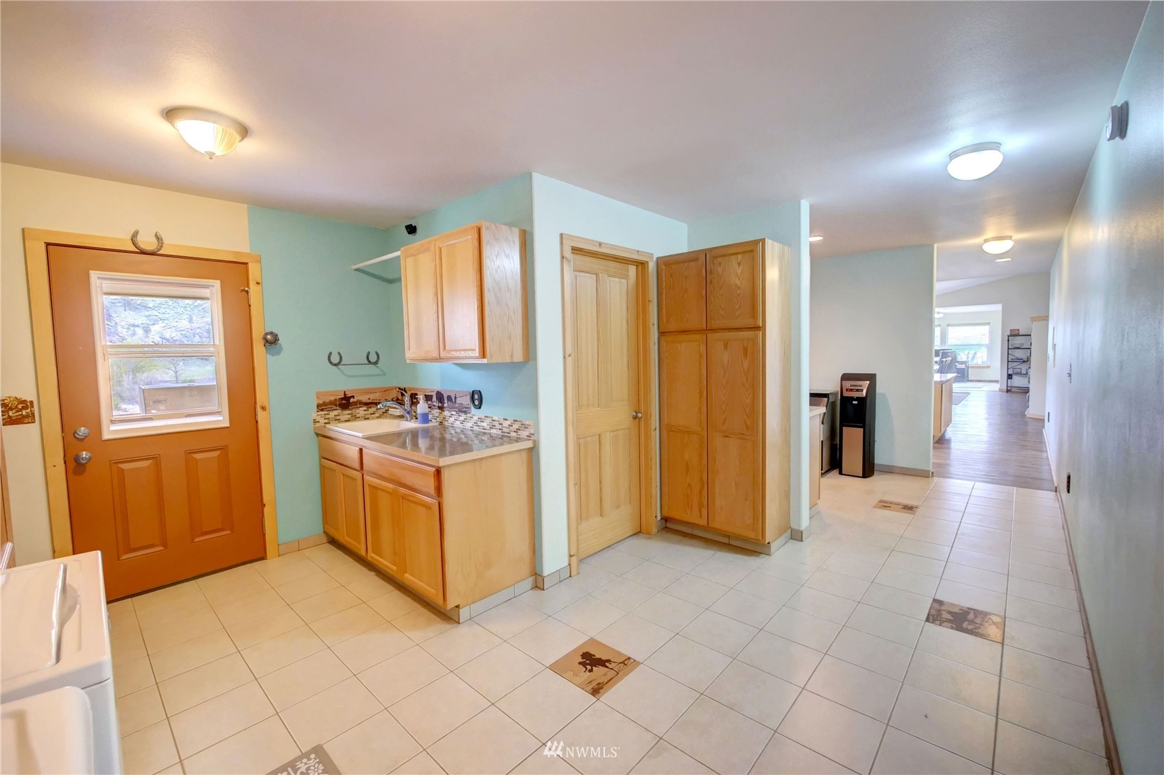 196 Pharr Road Riverside, WA 98849 - Photo 27 of 40 a large white kitchen with cabinets