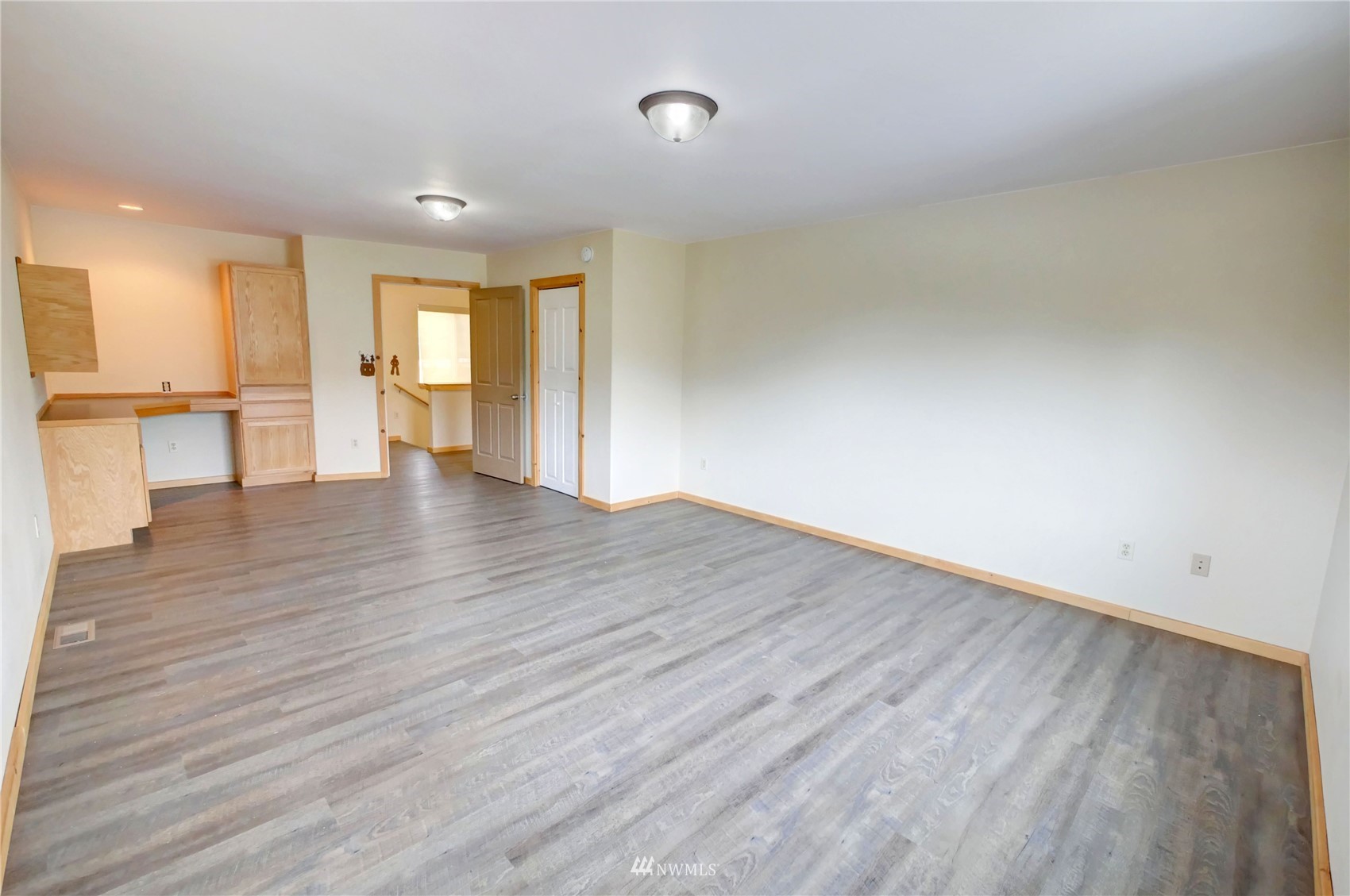 196 Pharr Road Riverside, WA 98849 - Photo 32 of 40 a view of an empty room with wooden floor and a window