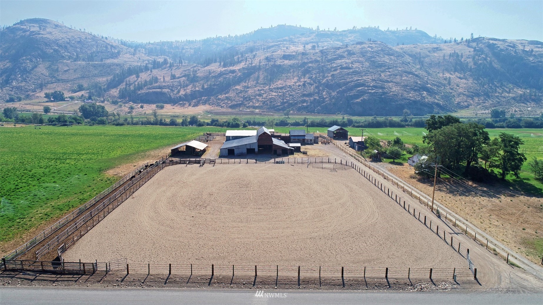 196 Pharr Road Riverside, WA 98849 - Photo 34 of 40 a view of a terrace with a yard