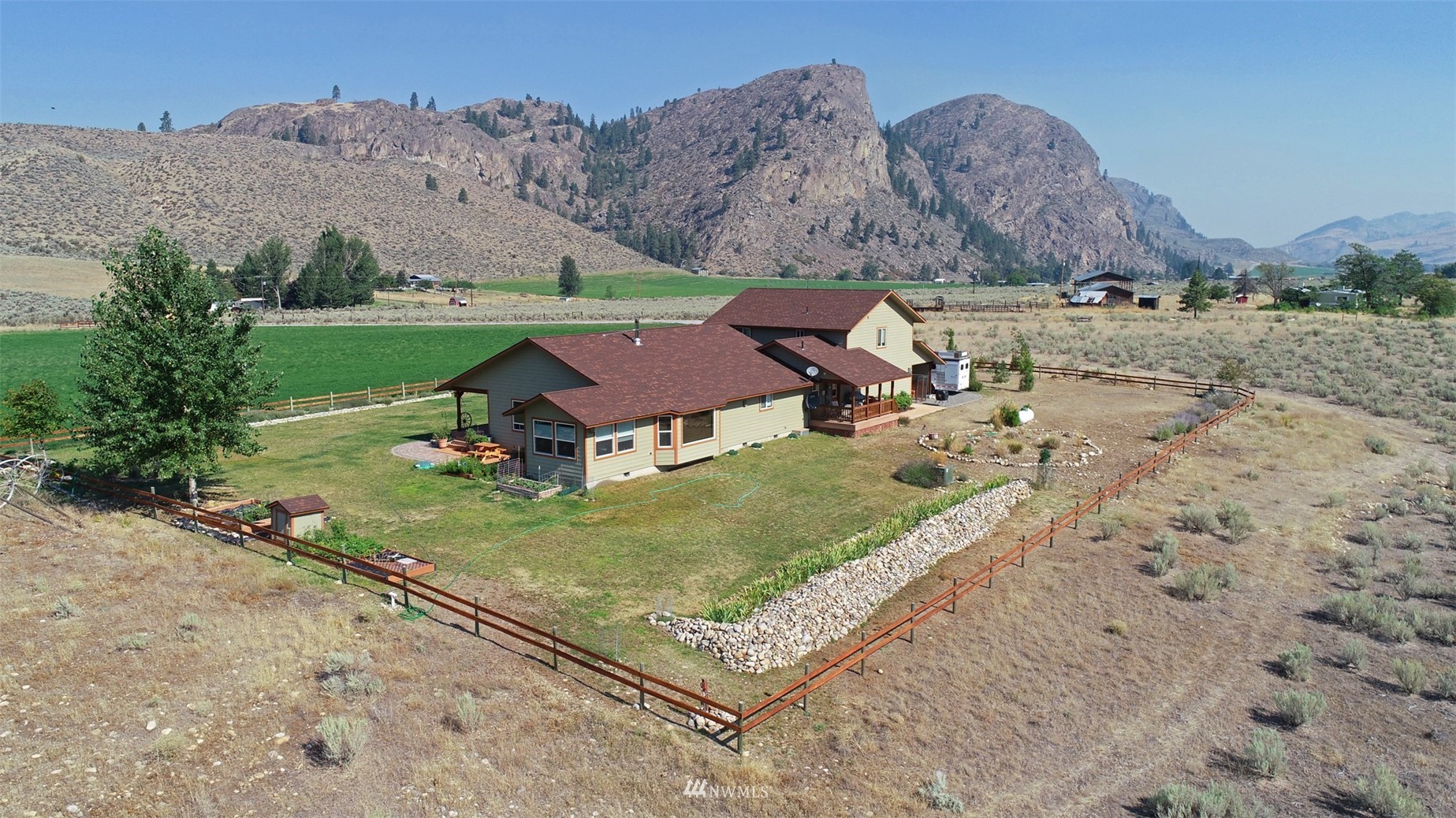196 Pharr Road Riverside, WA 98849 - Photo 4 of 40 an aerial view of a house
