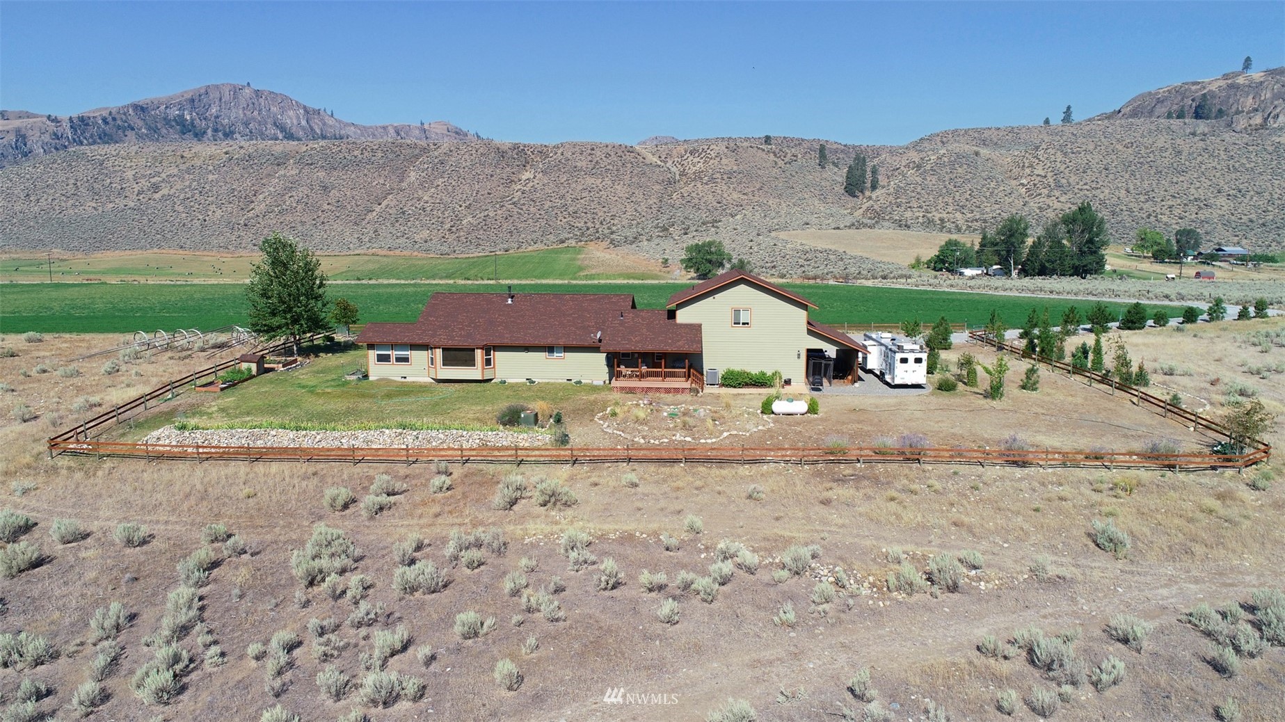 196 Pharr Road Riverside, WA 98849 - Photo 5 of 40 a view of houses with outdoor space