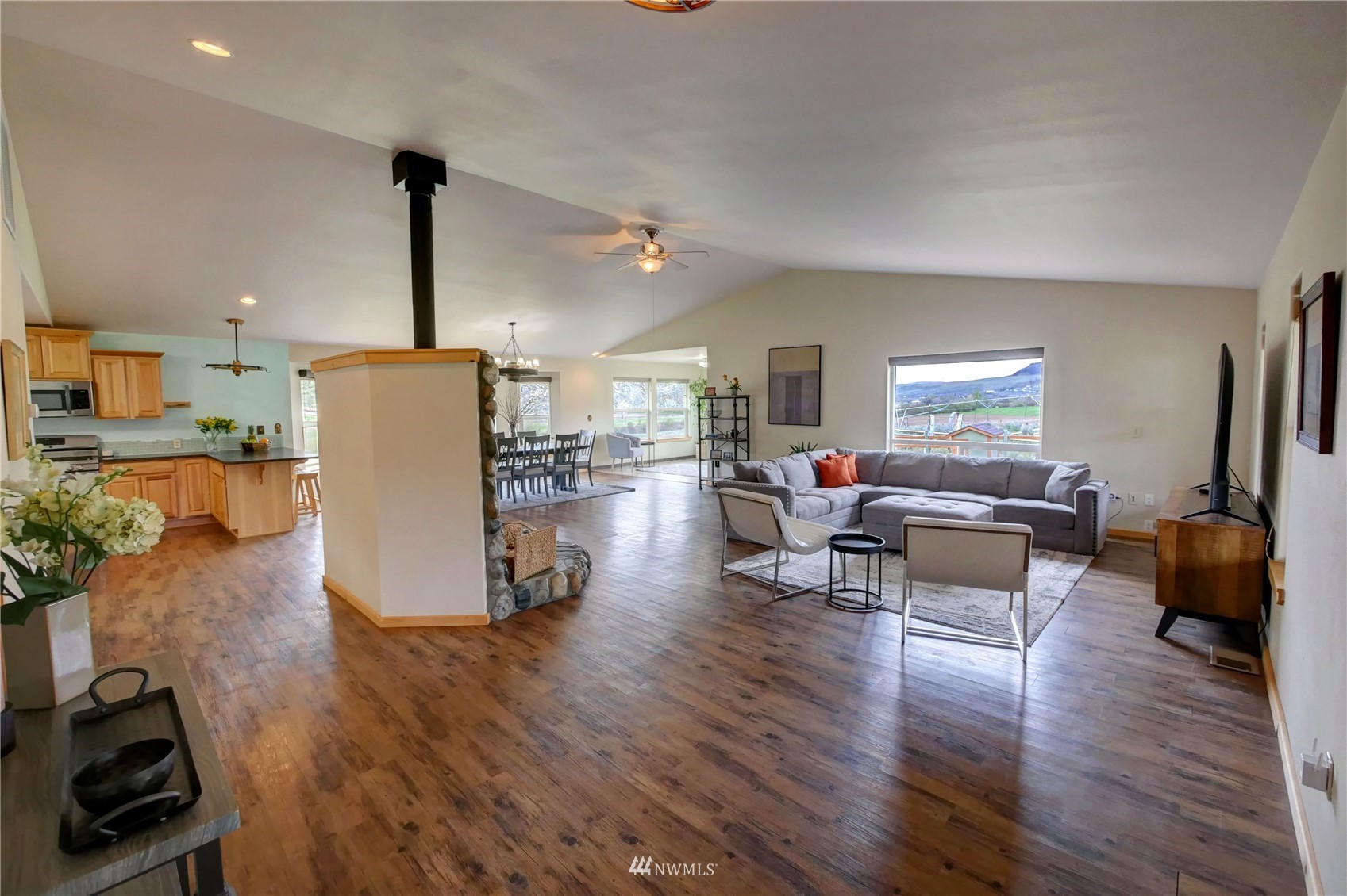 196 Pharr Road Riverside, WA 98849 - Photo 8 of 40 a living room with furniture and a wooden floor
