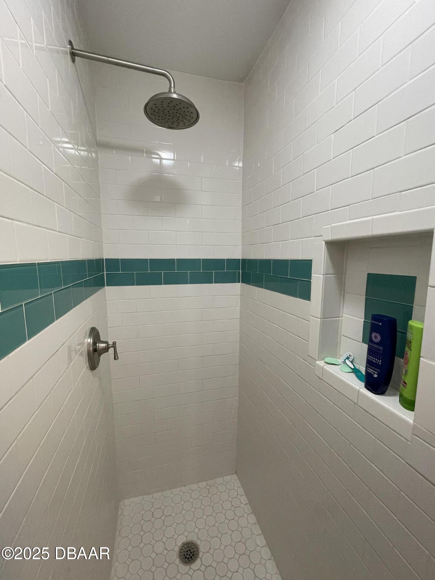 43 Warwick Avenue Ormond Beach, FL 32174 - Photo 17 of 32 a bathroom with a shower