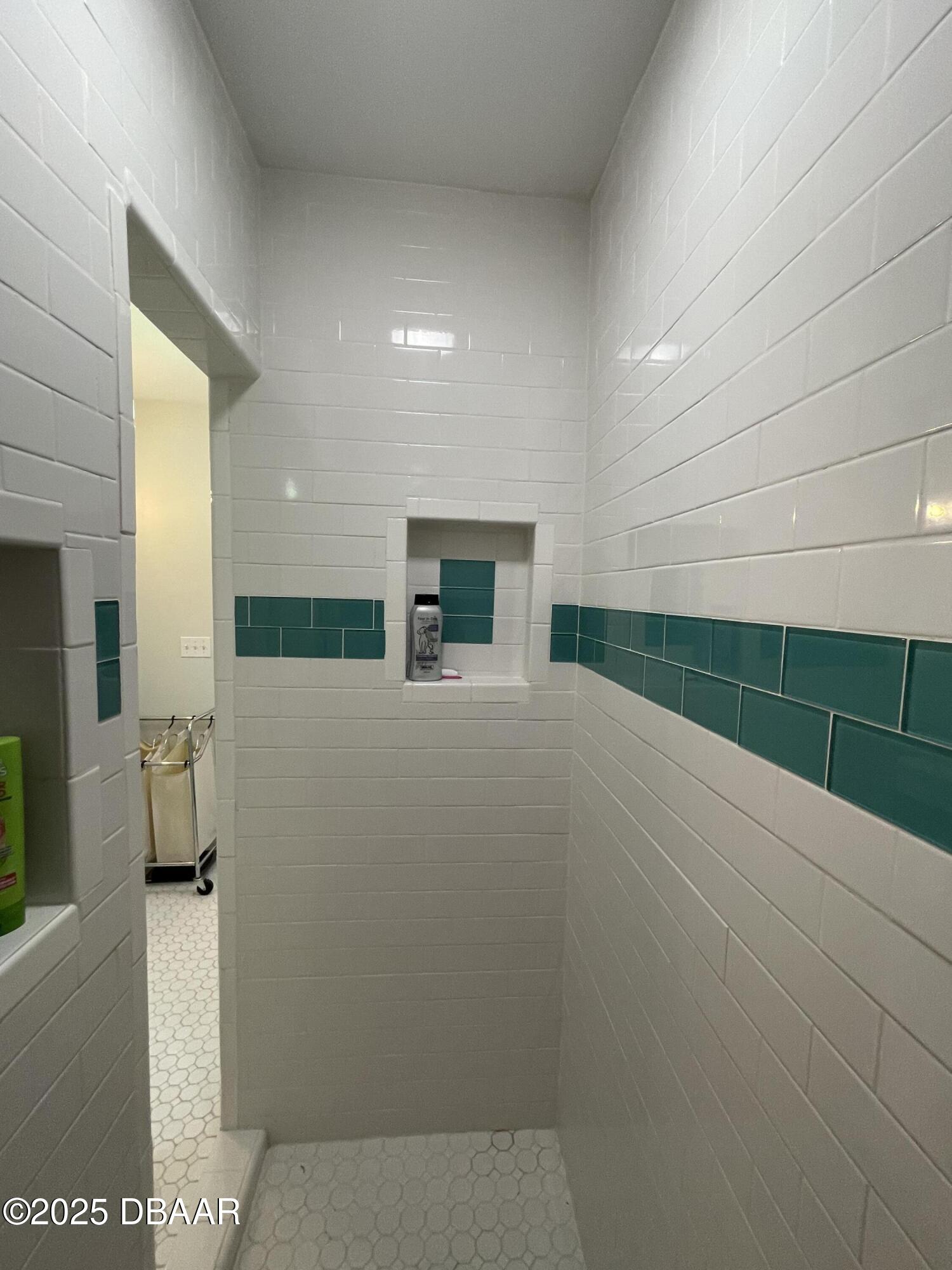 43 Warwick Avenue Ormond Beach, FL 32174 - Photo 18 of 32 a view of an empty room and kitchen view