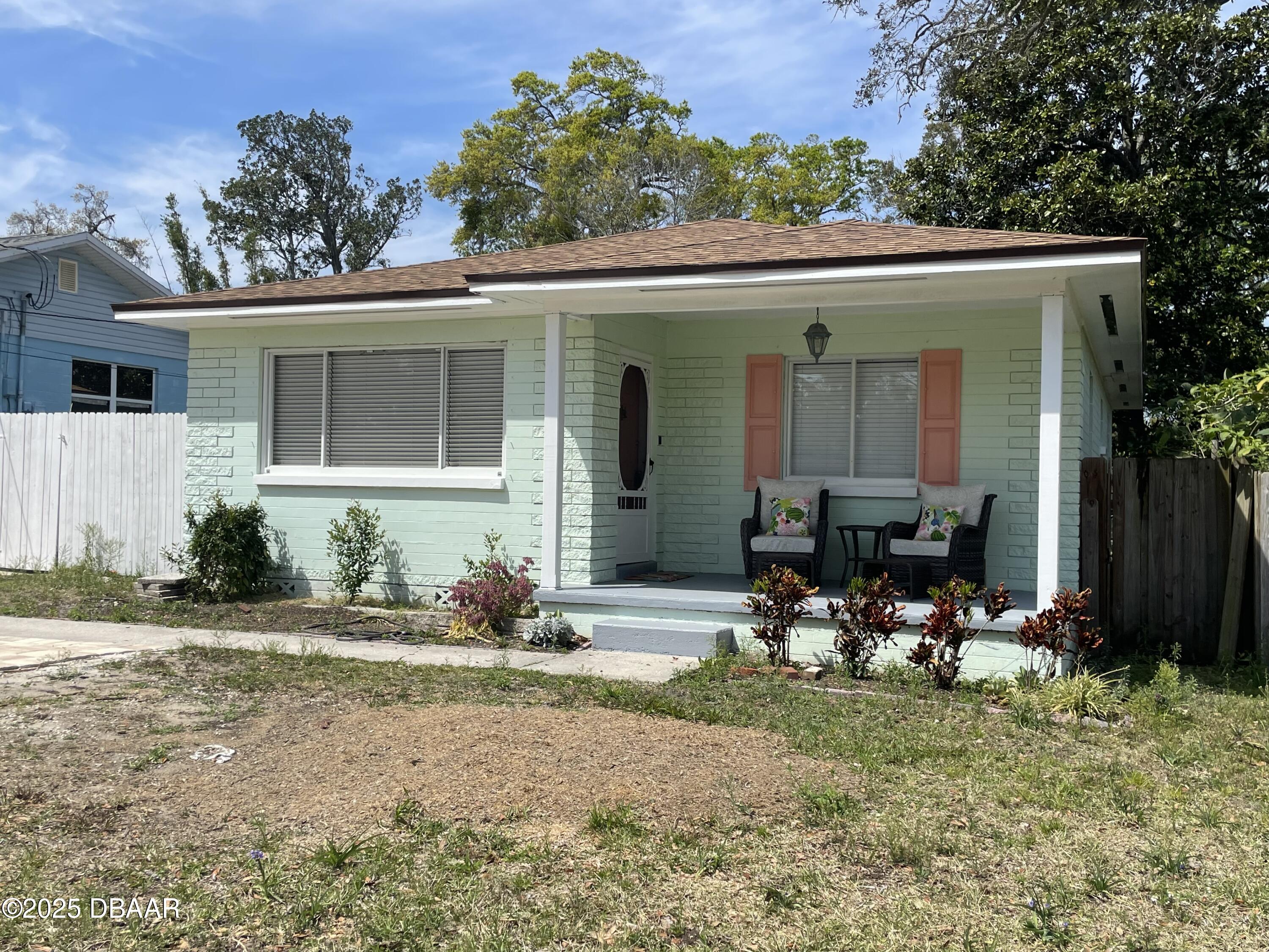43 Warwick Avenue Ormond Beach, FL 32174 - Photo 2 of 32 front view of a house with a small yard