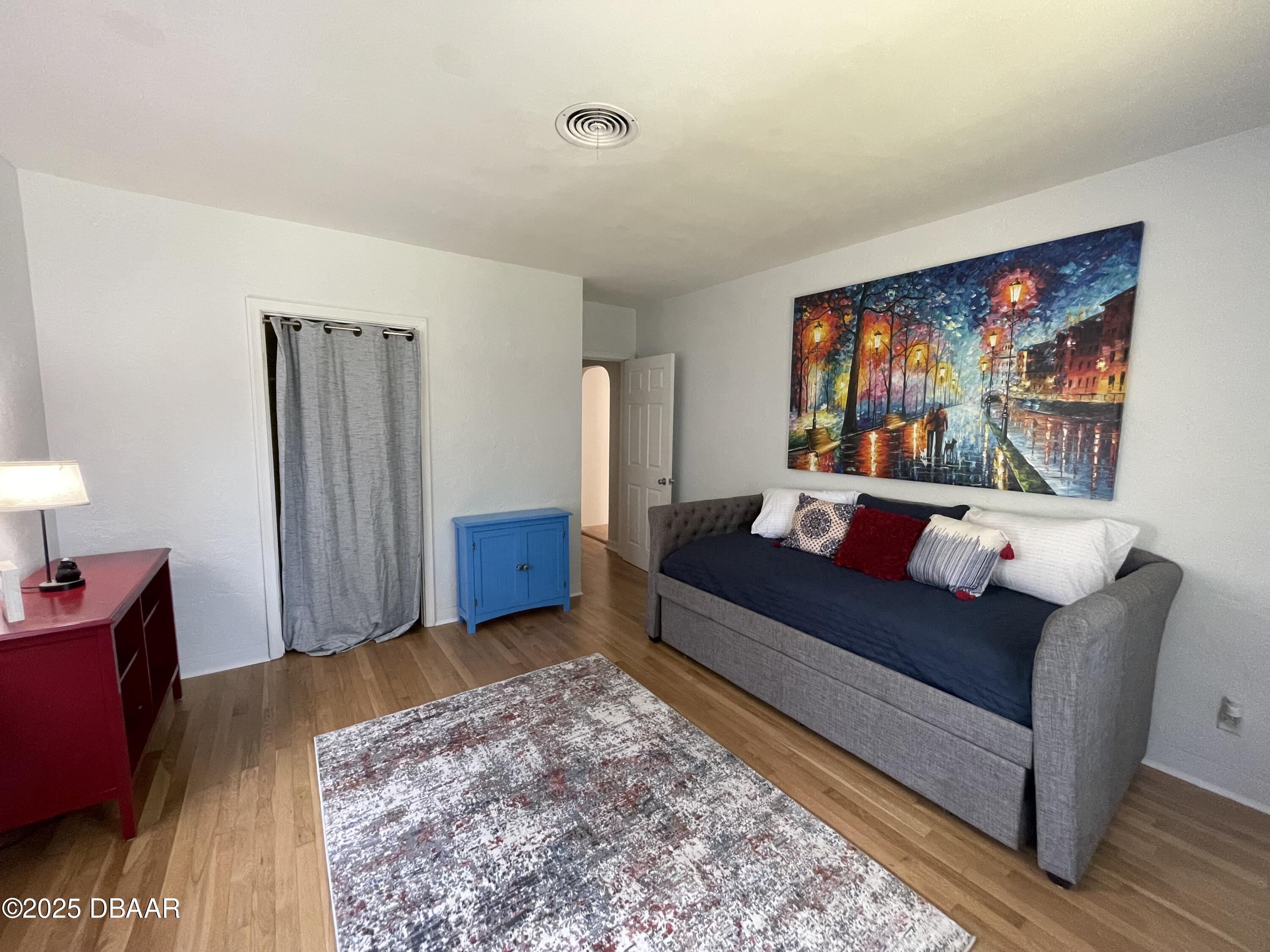 43 Warwick Avenue Ormond Beach, FL 32174 - Photo 28 of 32 a living room with furniture and a flat screen tv