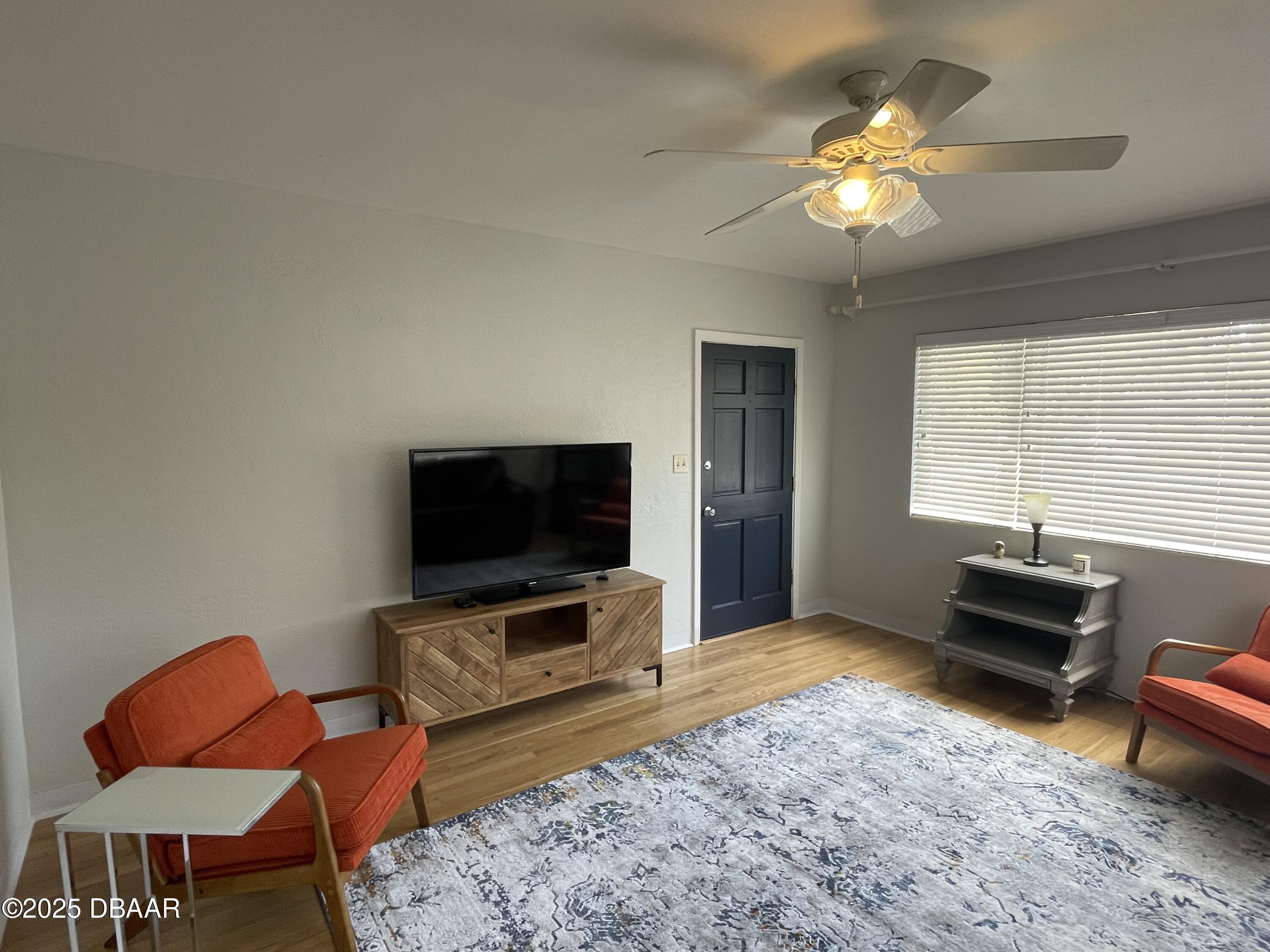 43 Warwick Avenue Ormond Beach, FL 32174 - Photo 4 of 32 a living room with furniture and a flat screen tv