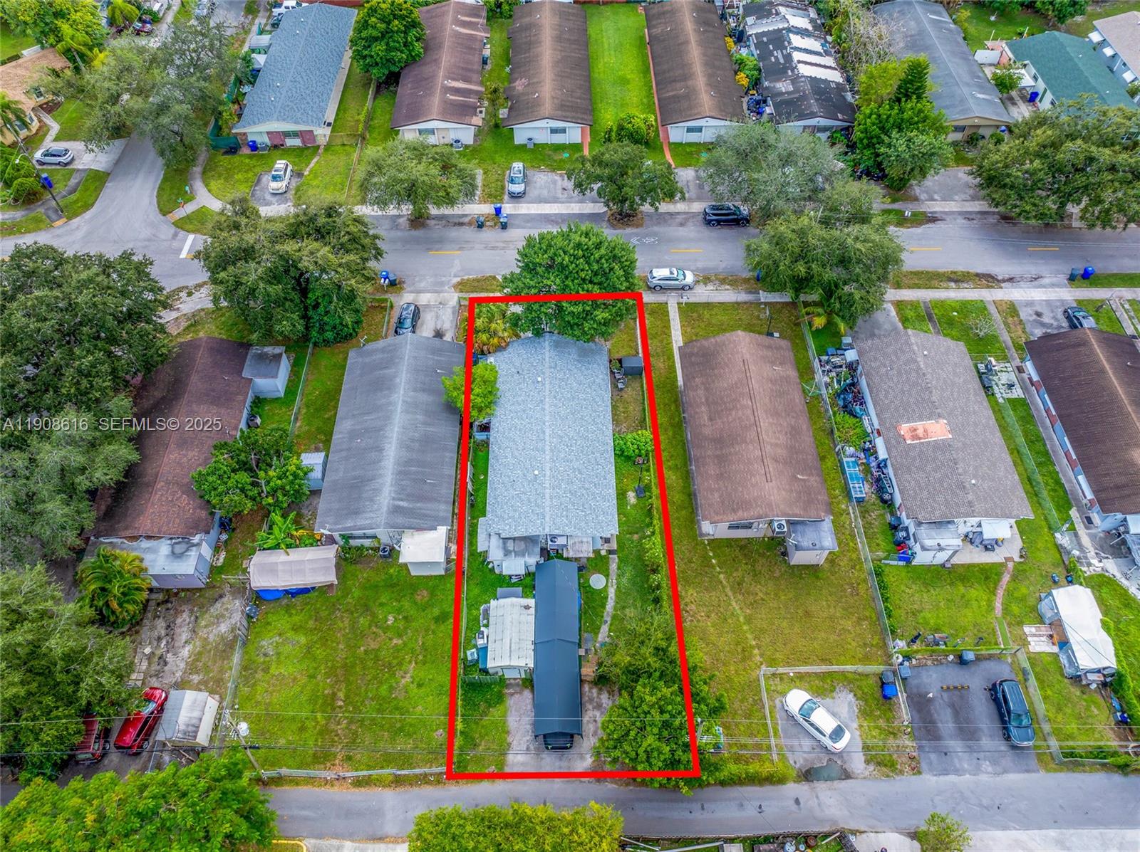 5709 Lincoln Street Hollywood, FL 33021 - Photo 11 of 17 an aerial view of multiple houses with yard