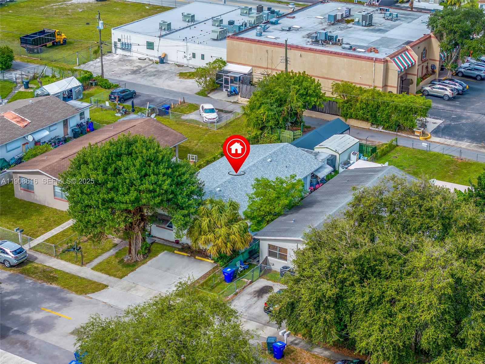 5709 Lincoln Street Hollywood, FL 33021 - Photo 16 of 17 an aerial view of a house