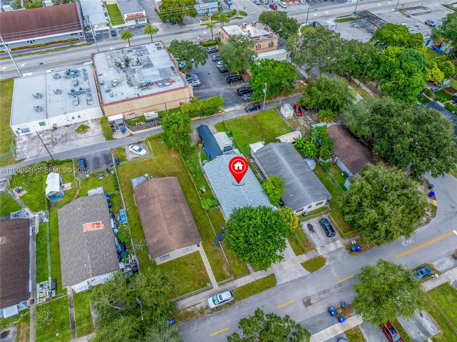 5709 Lincoln Street Hollywood, FL 33021 - Photo 9 of 17 an aerial view of residential houses and outdoor space