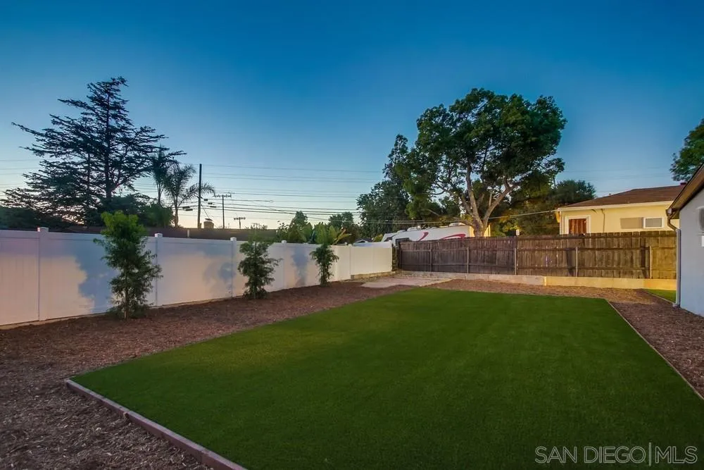 12378 Wade Way El Cajon, CA 92021 - Photo 12 of 48 a view of a garden with a house