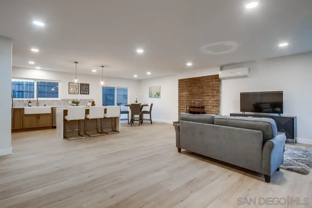 12378 Wade Way El Cajon, CA 92021 - Photo 13 of 48 a living room with furniture and a flat screen tv