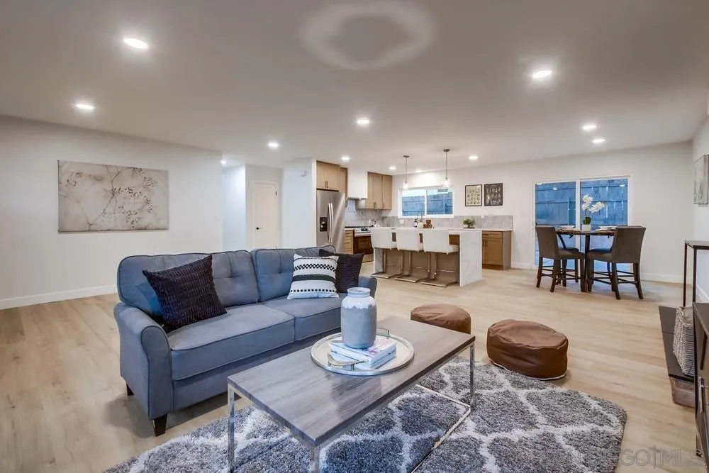 12378 Wade Way El Cajon, CA 92021 - Photo 15 of 48 a living room with furniture and a view of kitchen
