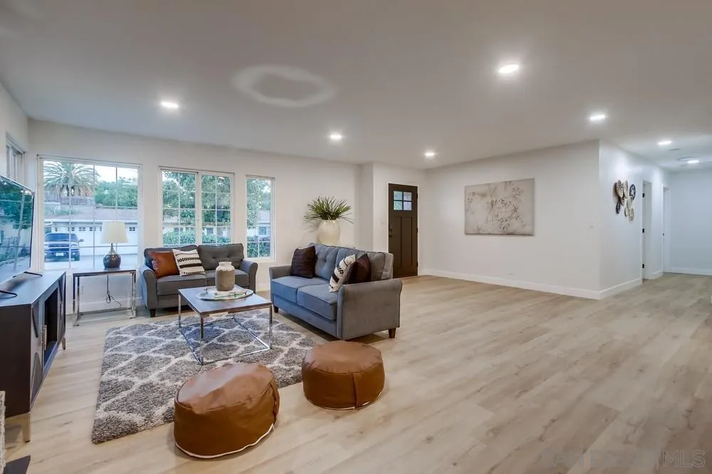 12378 Wade Way El Cajon, CA 92021 - Photo 16 of 48 a living room with furniture and a large window