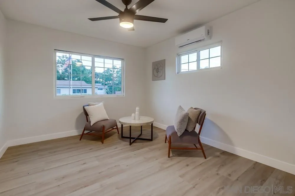 12378 Wade Way El Cajon, CA 92021 - Photo 30 of 48 a living room with furniture and windows