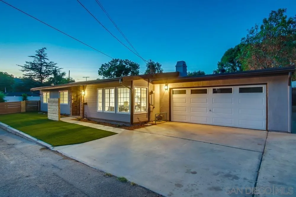 12378 Wade Way El Cajon, CA 92021 - Photo 3 of 48 a view of yellow house with a yard and potted plants