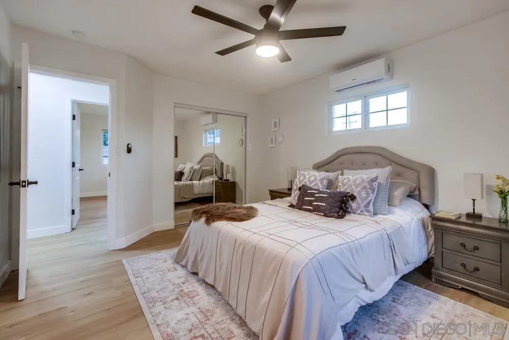 12378 Wade Way El Cajon, CA 92021 - Photo 34 of 48 a bedroom with a bed and window