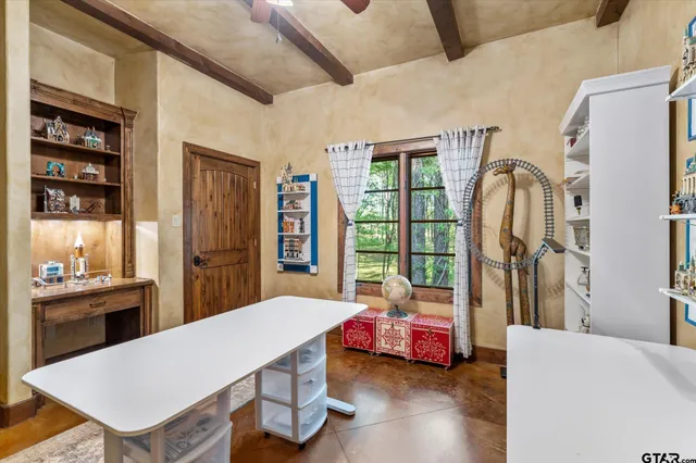 a bed room with a bed and a table