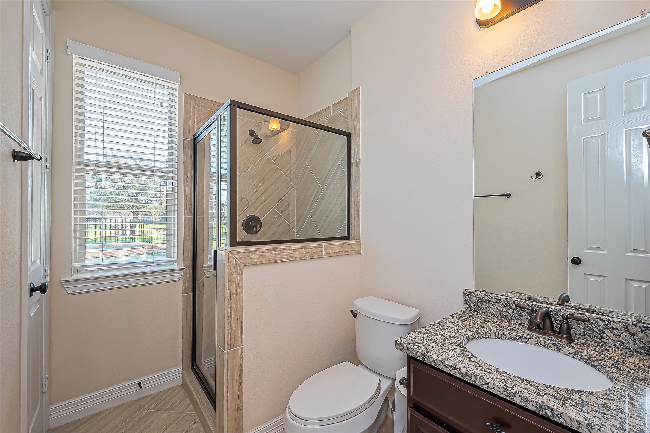 10018 Durango Path Lane Cypress, TX 77433 - Photo 21 of 50 Modern full bathroom with elegant finishes and ample natural light.