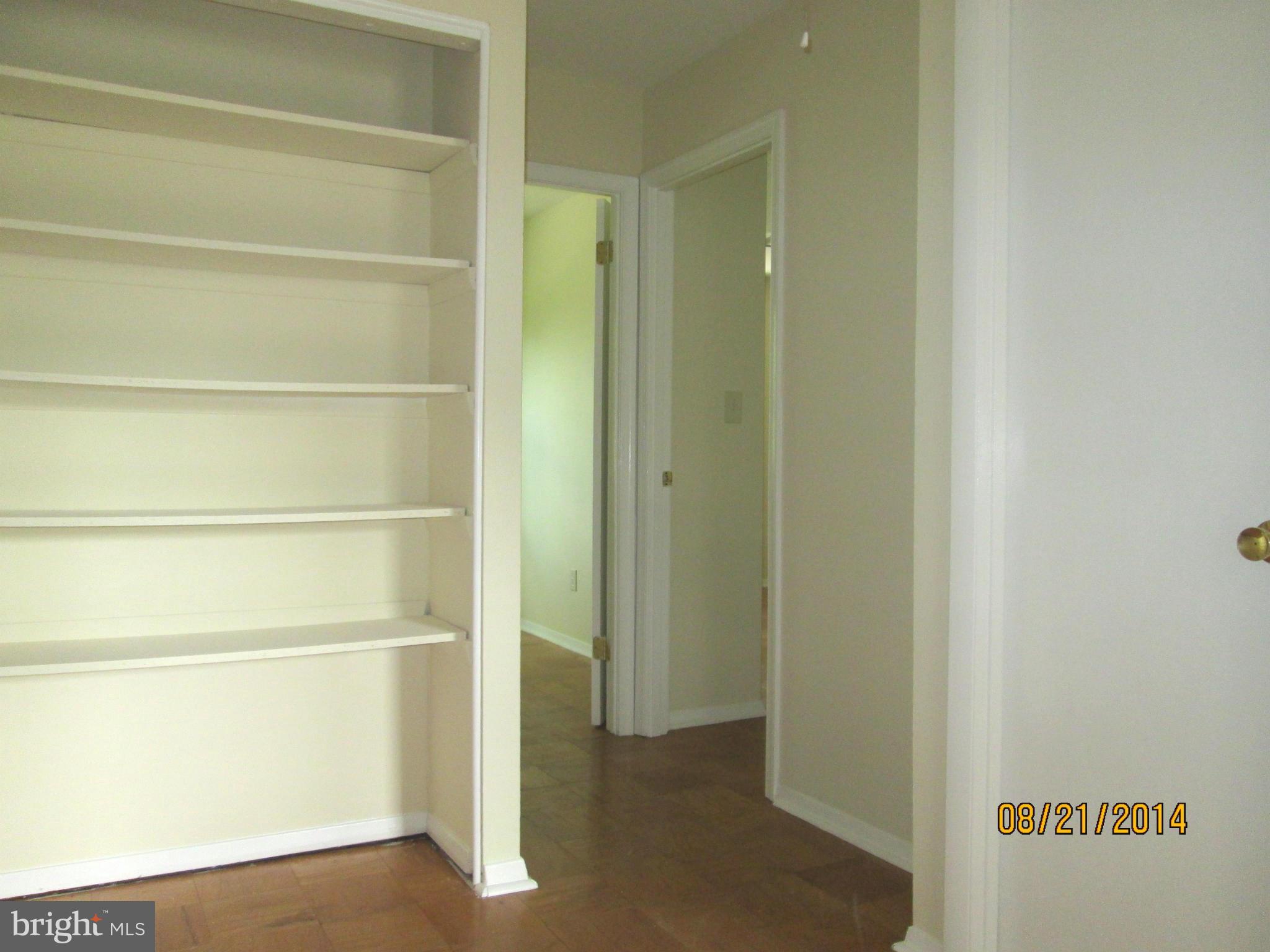 416 Falling Spring Court Reisterstown, MD 21136 - Photo 11 of 16 a view of walk in closet with empty racks