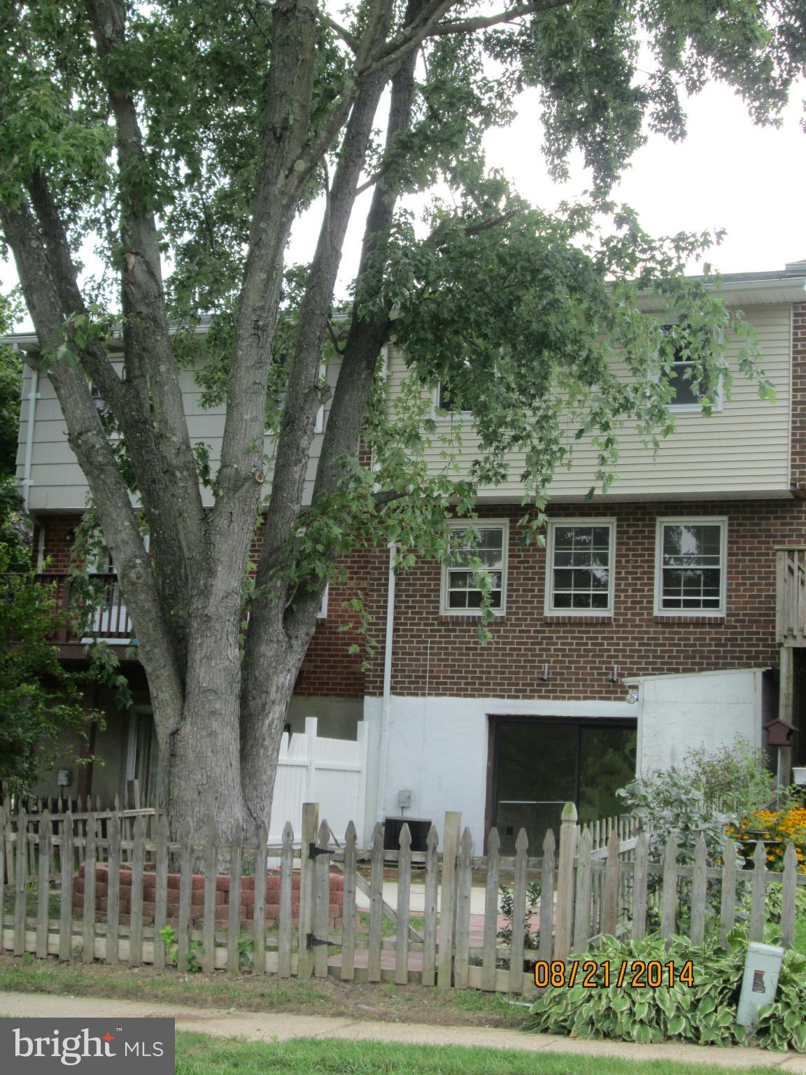 416 Falling Spring Court Reisterstown, MD 21136 - Photo 15 of 16 a view of backyard of house with trees all around