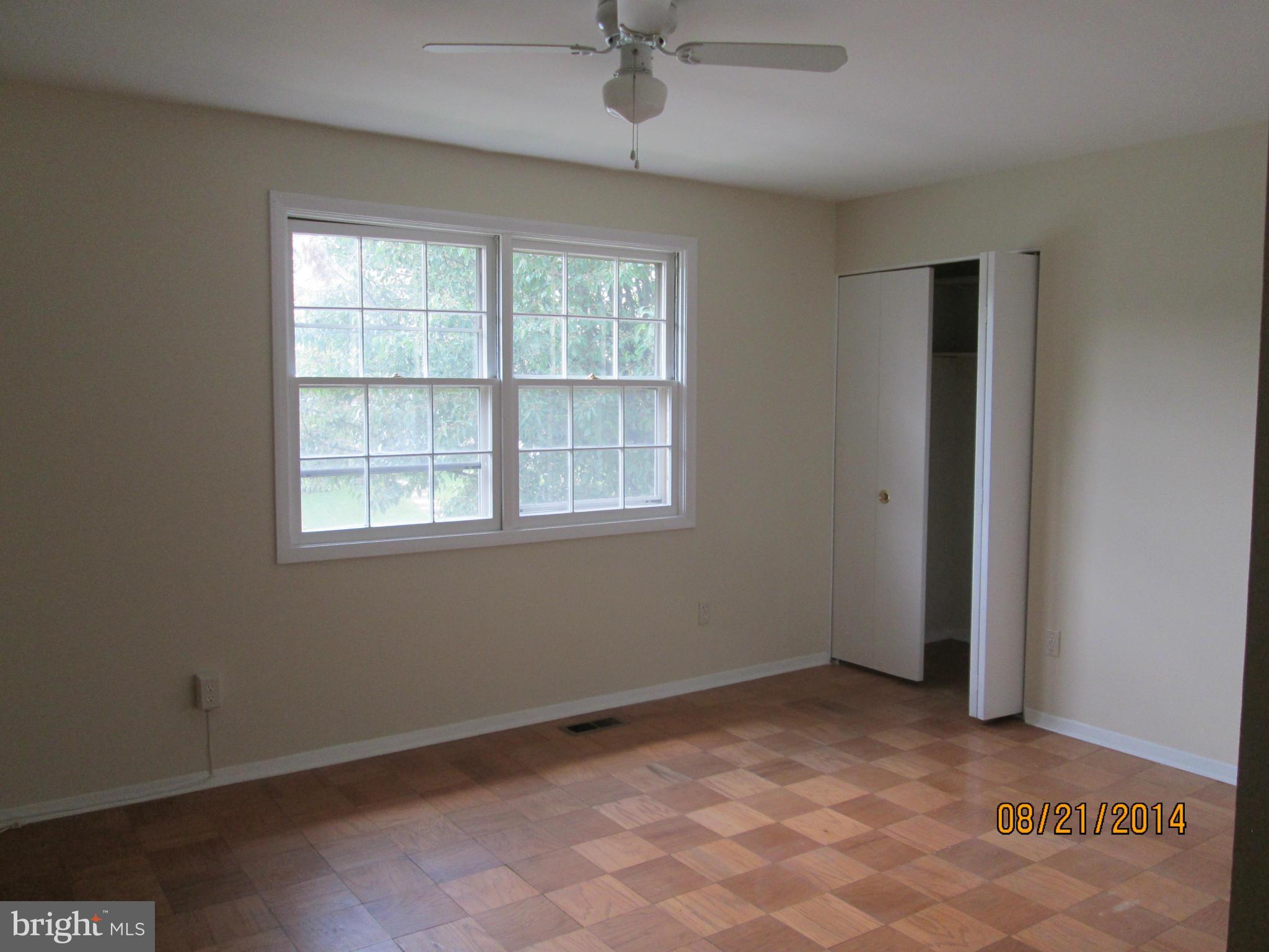 416 Falling Spring Court Reisterstown, MD 21136 - Photo 9 of 16 a view of an empty room with a window