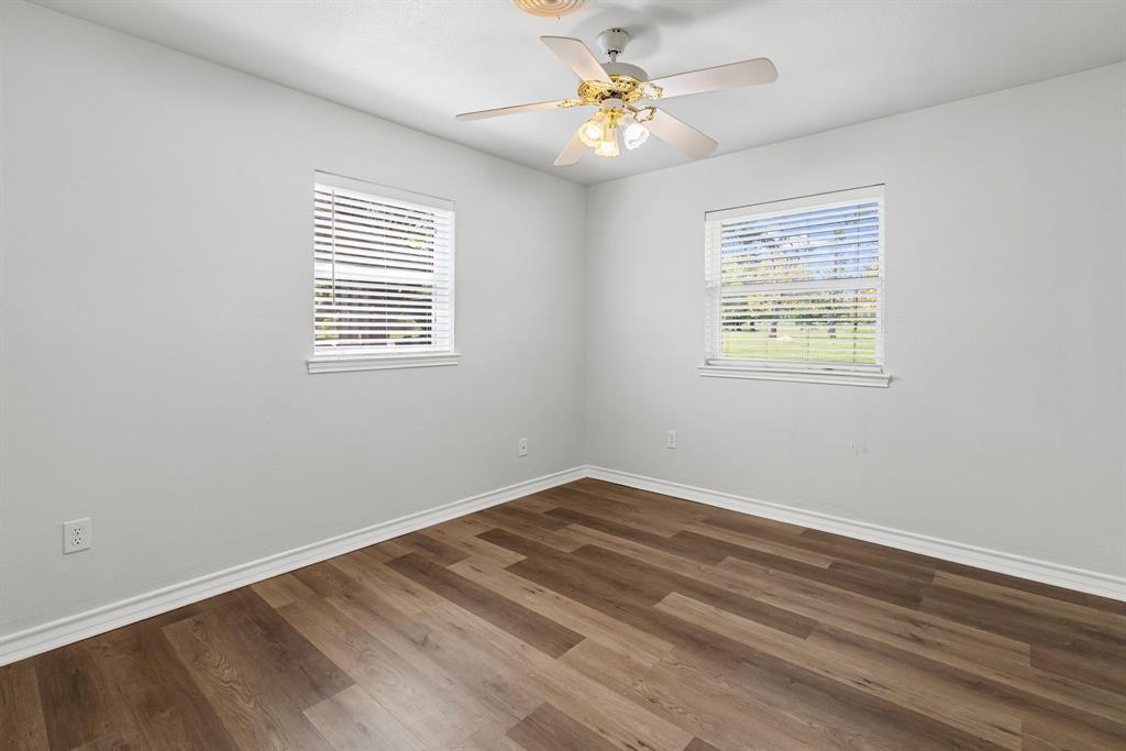 741 Southwest 9th Street Cooper, TX 75432 - Photo 22 of 36 a view of an empty room with a window