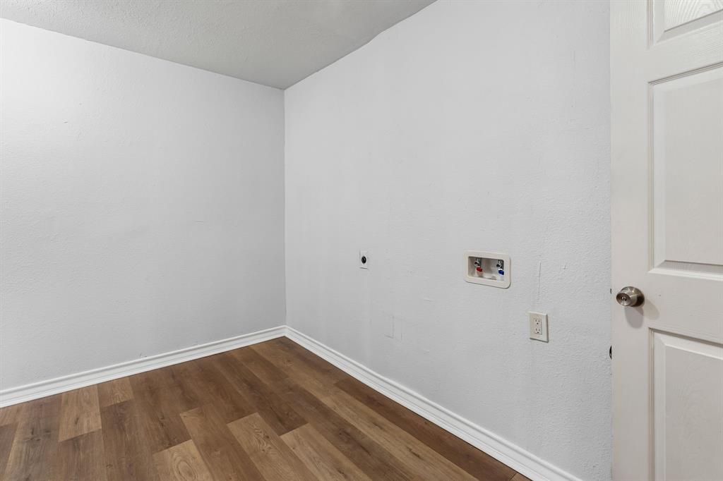 741 Southwest 9th Street Cooper, TX 75432 - Photo 27 of 36 a view of small space with empty racks