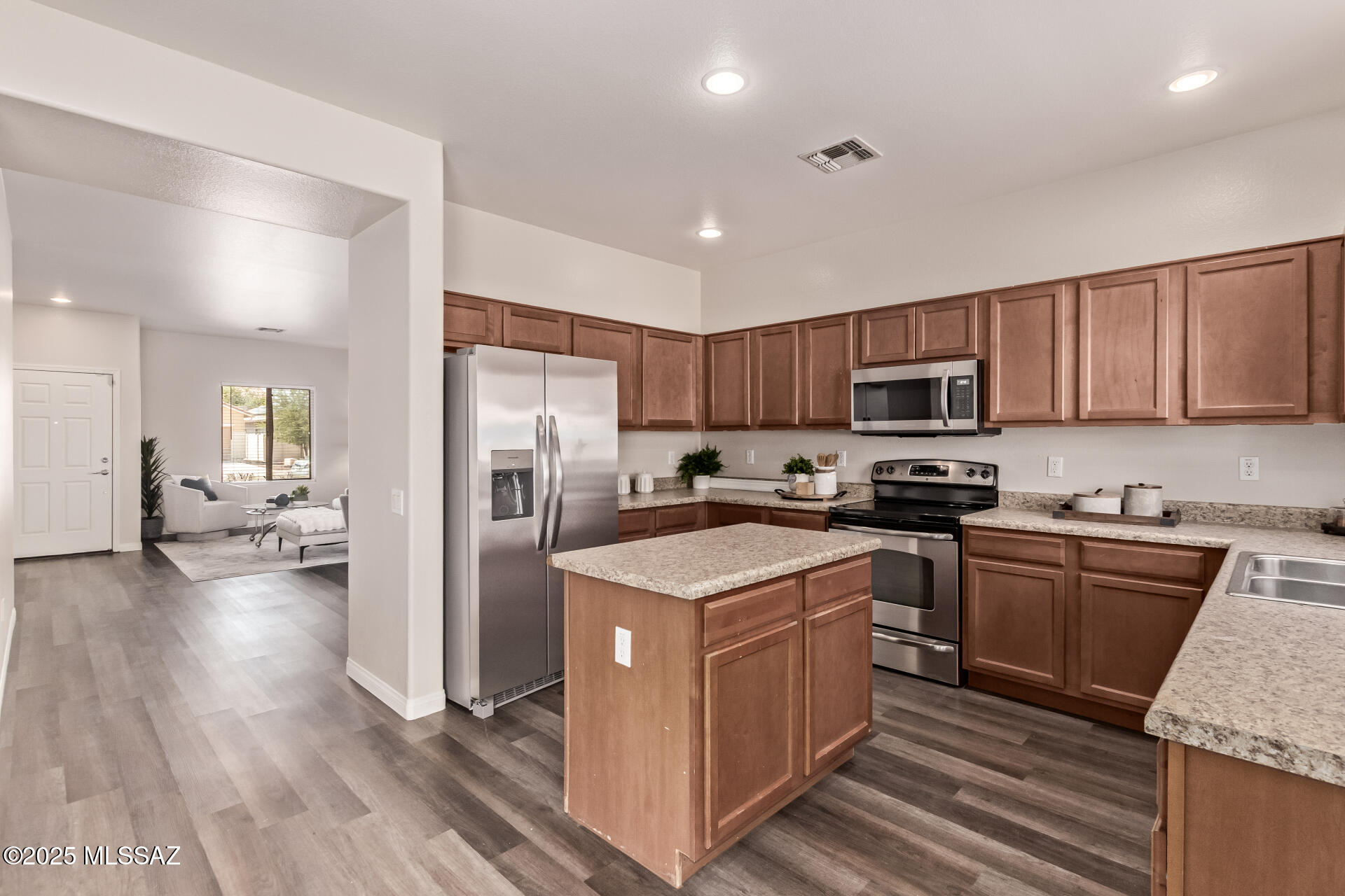 20950 East Frontier Road Red Rock, AZ 85145 - Photo 15 of 44 a kitchen with a sink stove and refrigerator