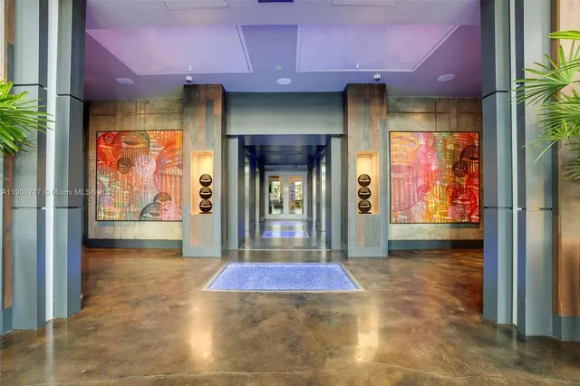 a view of a building with door and outdoor space