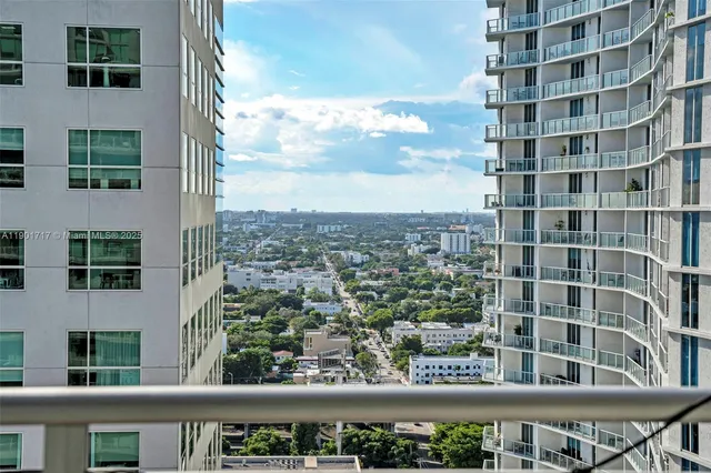 a view of a building from a balcony