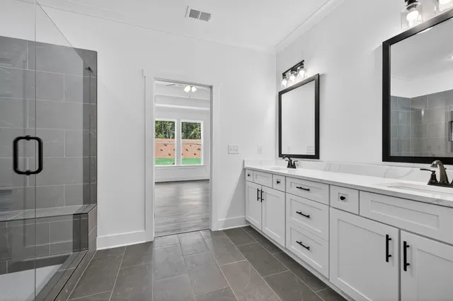 a view of a room with a cabinet and a bookshelf