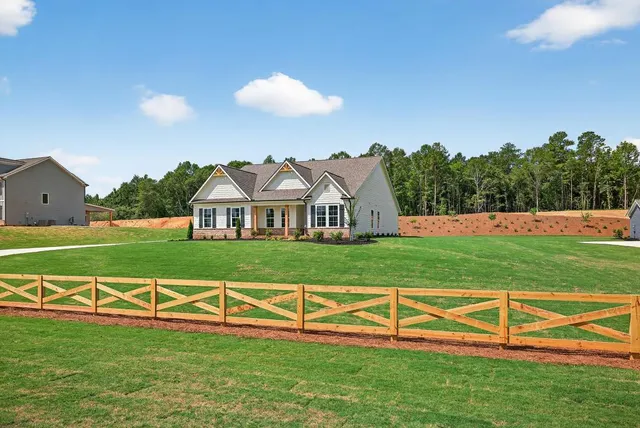 a view of a house with a big yard