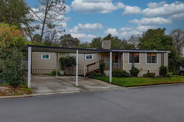 front view of a house with a small yard