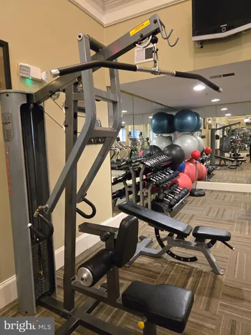 a view of a swimming pool with a yard