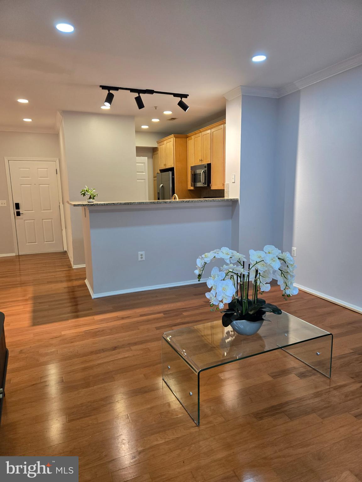 11800 Old Georgetown Road, Unit 1537 North Bethesda, MD 20852 - Photo 6 of 20 a view of a room with wooden floor