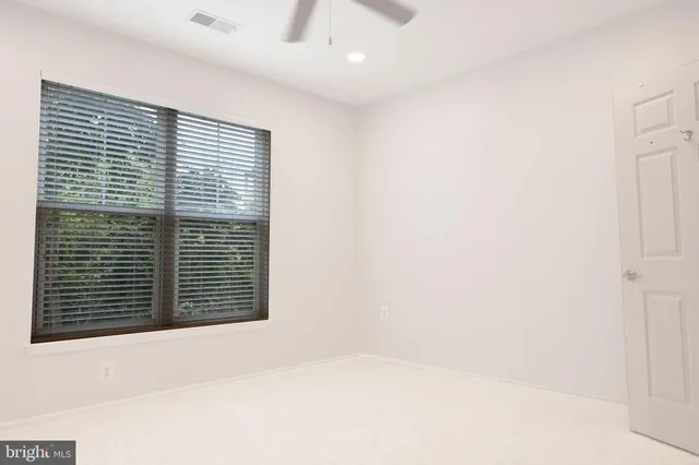 a view of empty room with a window