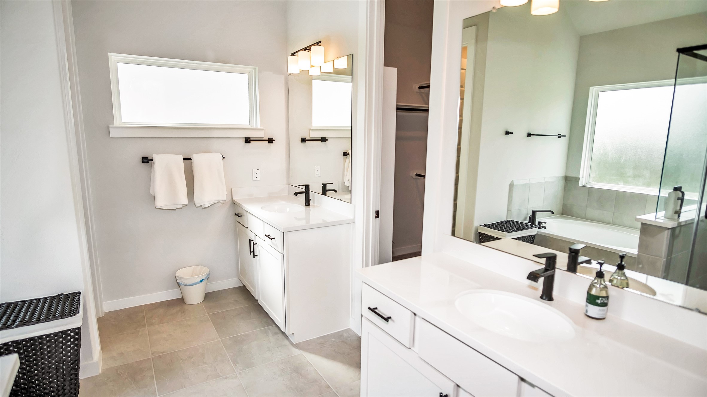 1919 Pueblo Nuevo Path Houston, TX 77077 - Photo 4 of 50 a bathroom with a sink a toilet and mirror