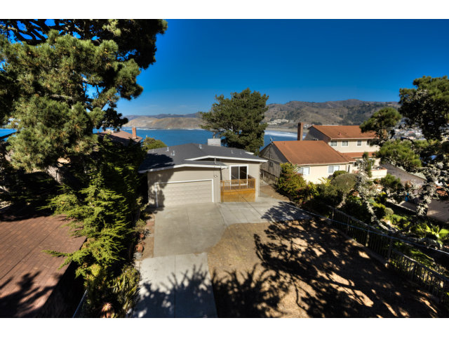 265 Kent Road Pacifica, CA 94044 - Photo 1 of 23 a view of a house with a yard