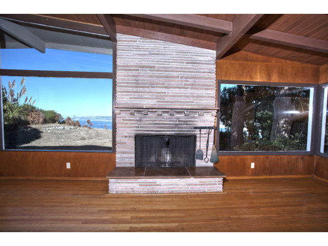 265 Kent Road Pacifica, CA 94044 - Photo 7 of 23 a view of living room with furniture and a fireplace