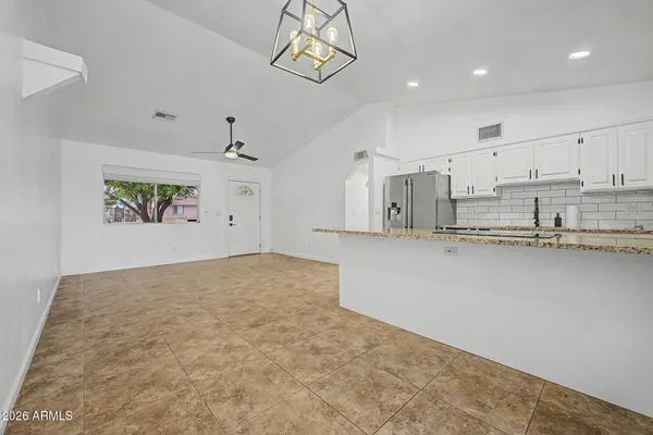 a view of a kitchen with a sink