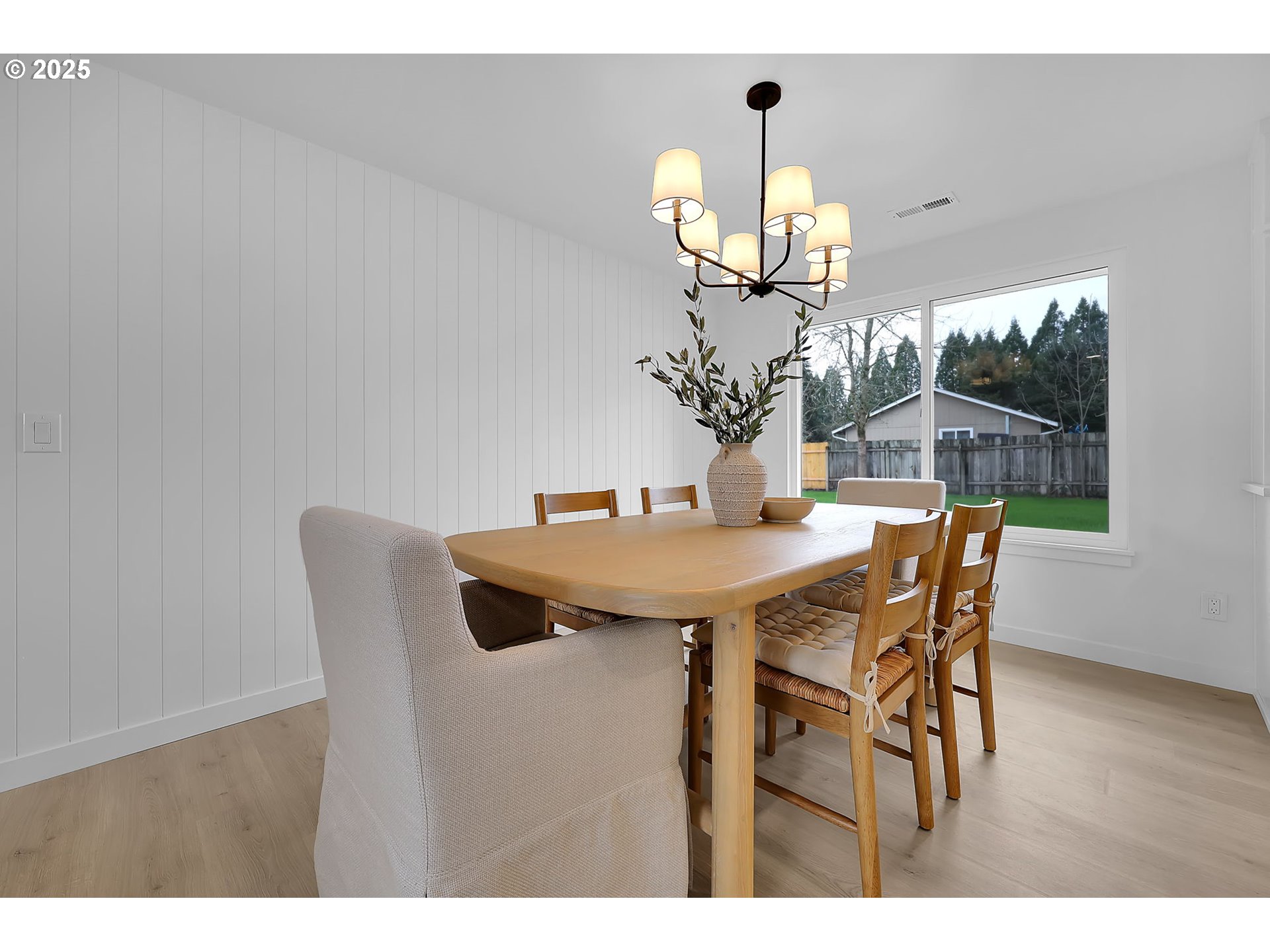 1090 Dixie Drive Springfield, OR 97478 - Photo 11 of 48 a view of a dining room with furniture and wooden floor